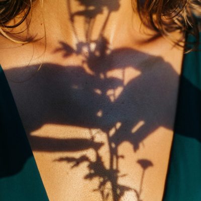 shadow flowers on woman skin